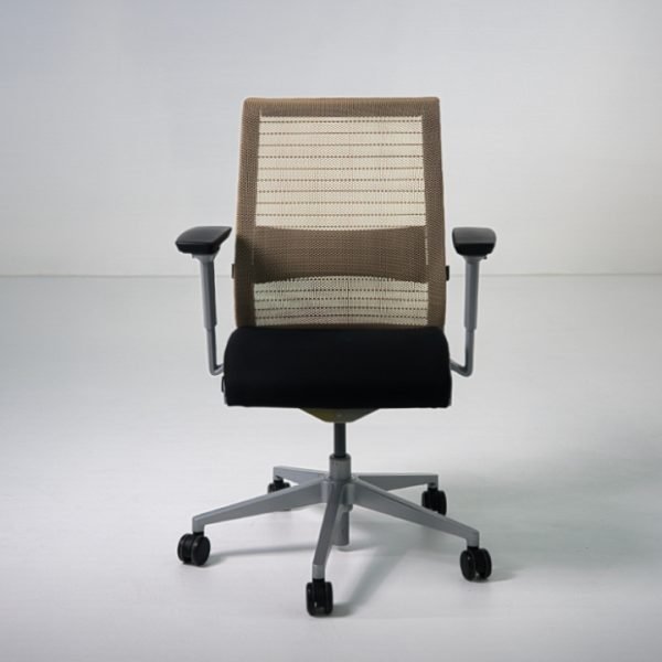 Refurbished Steelcase Think V1 task chair with tan mesh back and black fabric seat