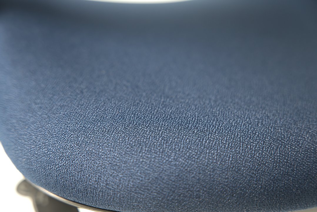 Close-up detail of refurbished Steelcase Leap V2 chair in navy