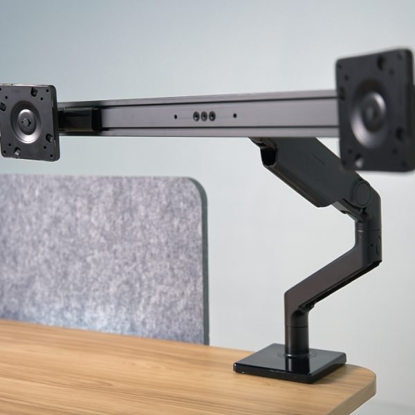 Preowned Teknion HiSpace sit-stand desk with dual monitor arm