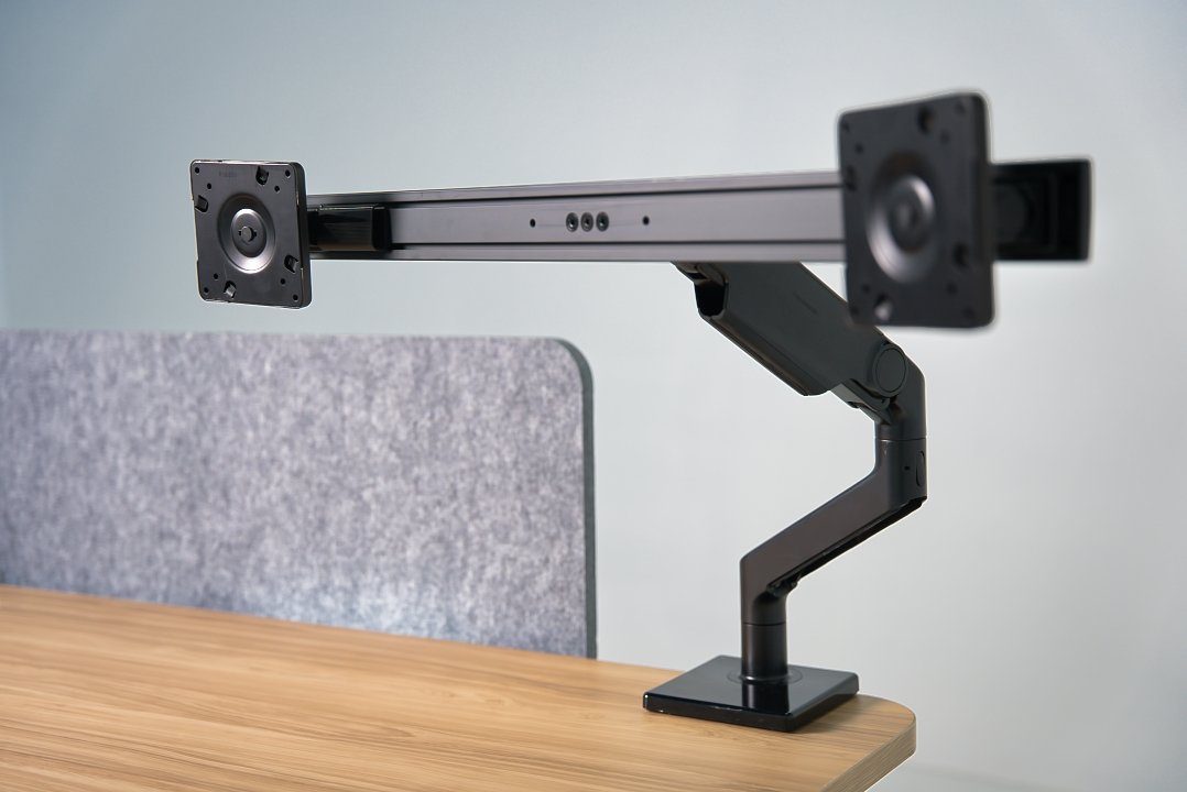 Preowned Teknion HiSpace sit-stand desk with dual monitor arm
