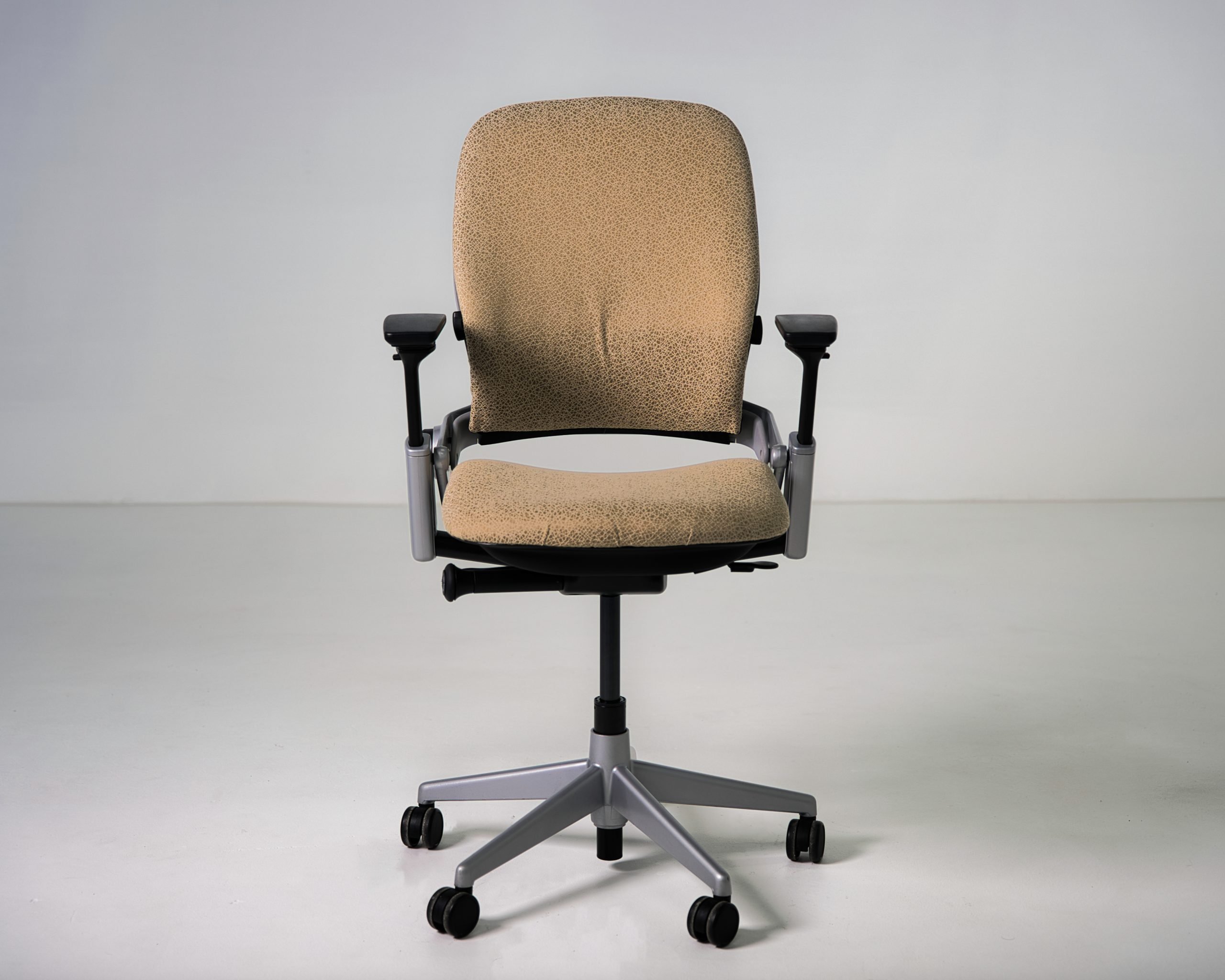 Refurbished Steelcase Leap V2 task chair in tan patterned fabric front view