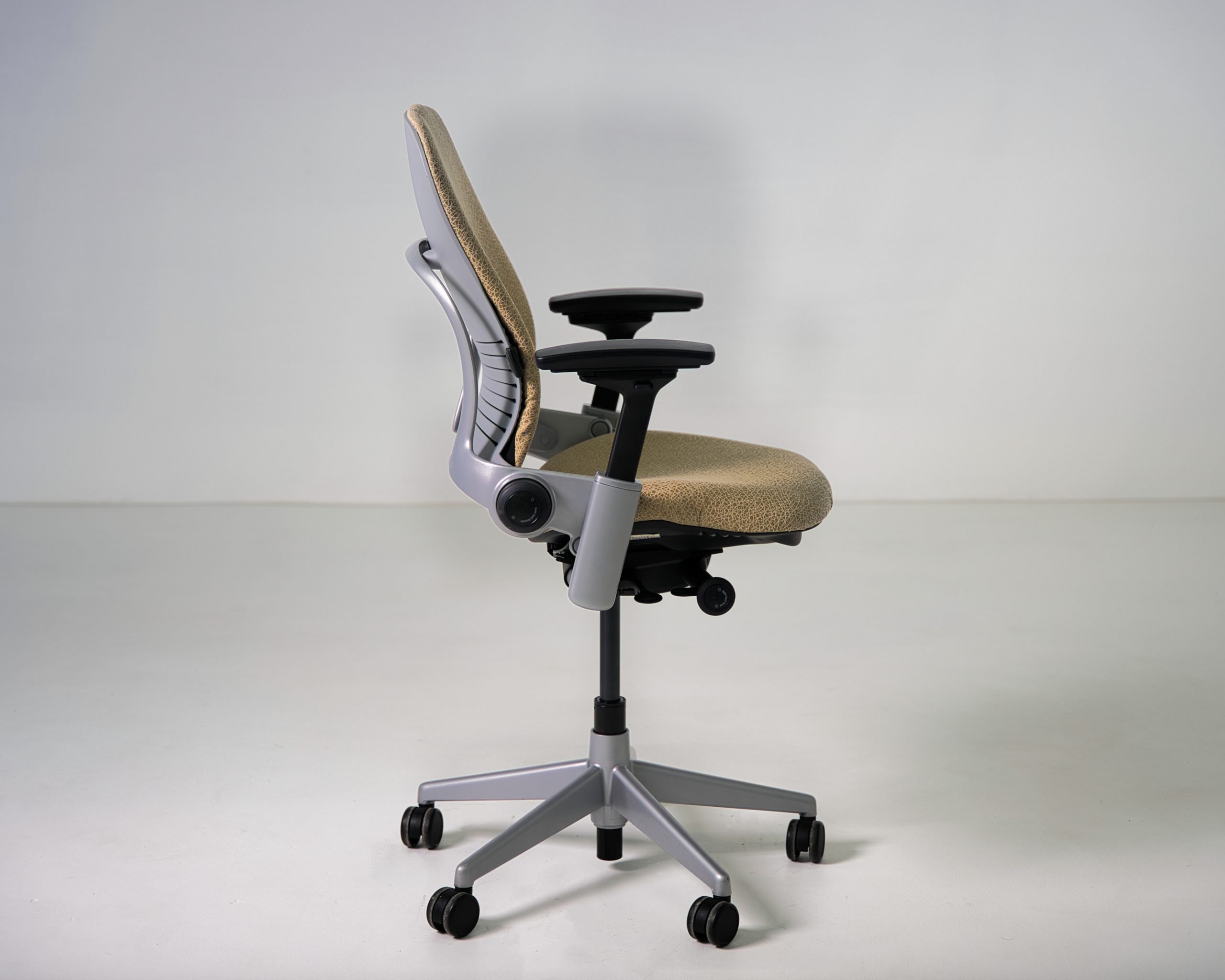 Refurbished Steelcase Leap V2 task chair in tan patterned fabric side view