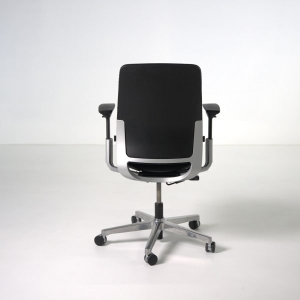 Back view of refurbished Steelcase Amia chair showing black frame and LiveLumbar backrest